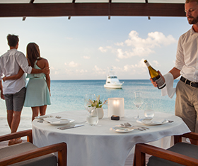 Guest enjoying the view while dining at Lizard Island